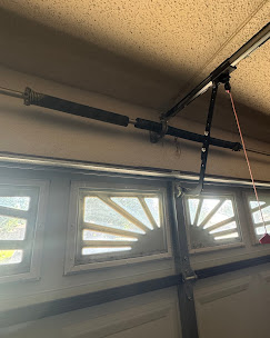 Dual torsion spring setup on a residential garage door