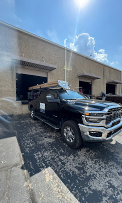 USTX Doors & Gates service truck at the shop